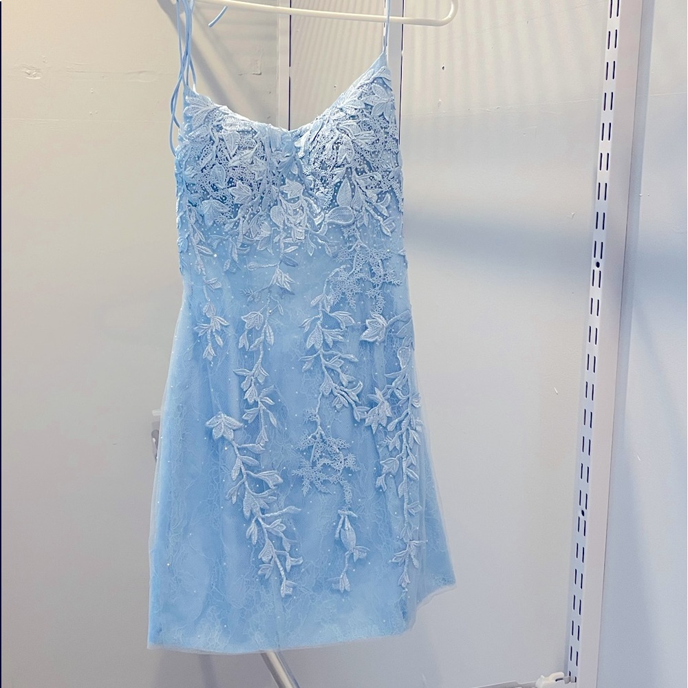 This dress from Berlinnova is a beautiful blue, size says 8 but fits like a 4.